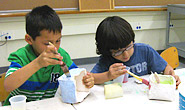 campers creating pottery